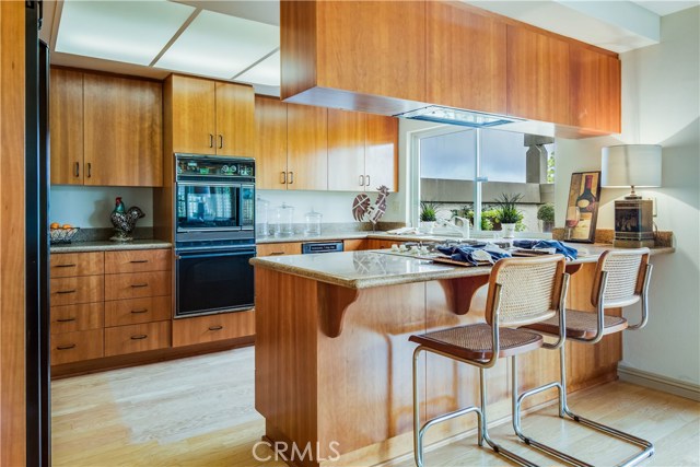 Kitchen area with breakfast bar
