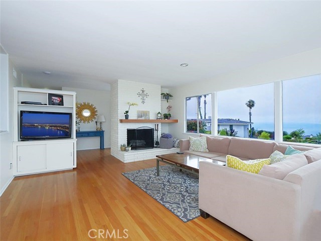 Beautiful hardwood floor and fireplace