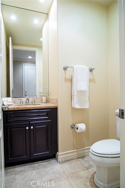 Powder room on the lower level next to the full bath but completely separate