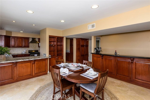 Formal Dining and Built-in Bar Area off Kitchen.