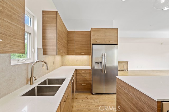 Quartz counters and custom veneer cabinets from Germany