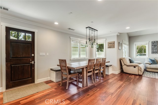 Dining area and  dutch door to driveway and garage