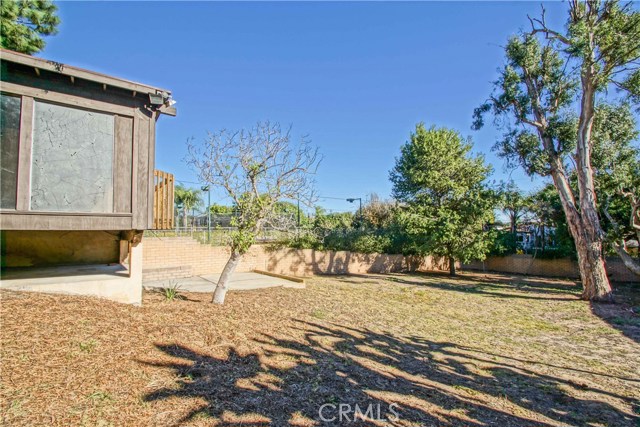 The structure to the left is the garage, and the yard.