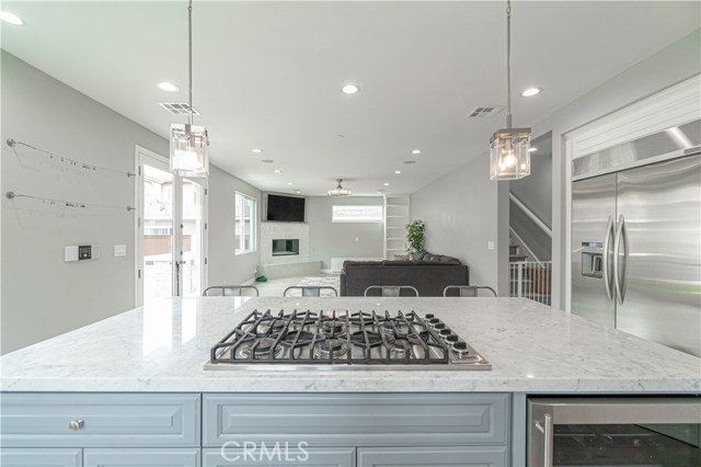 Island Cook-top and view of family room