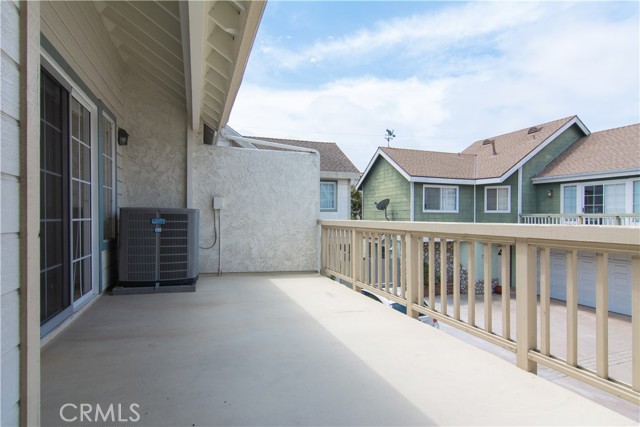Spacious balcony - access from living and master