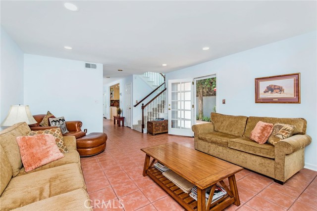 Generous Living Room Opening to Backyard.