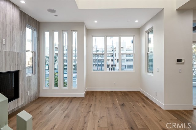 Wide plank European hardwood floors and lots of natural light