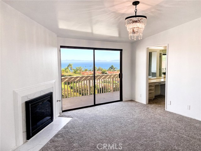 Master bedroom - enjoy the stunning Catalina Island and ocean views from the Master deck which stretches across the entire length of the home.