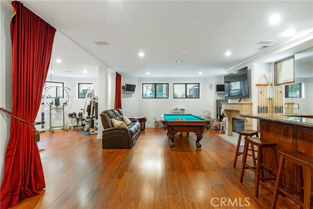 Finished Basement with Bar, Pool Table, Workout Area, Potential 6th Bedroom & Bathroom w/shower plus storage!