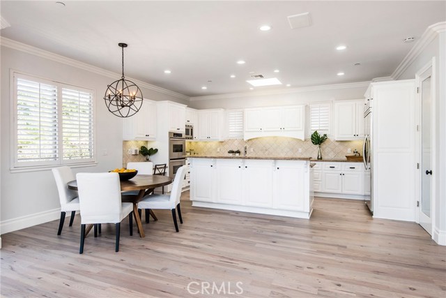 Additional breakfast nook off of the kitchen and huge walk in pantry to the right of the kitchen.