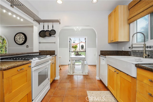 Kitchen with dining area. Gas range cook top and oven