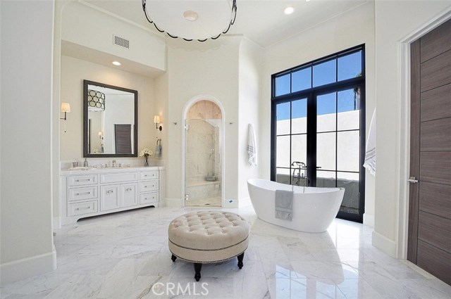 Tub, Double Shower as well as His & Hers Vanity & Toilet in MBA