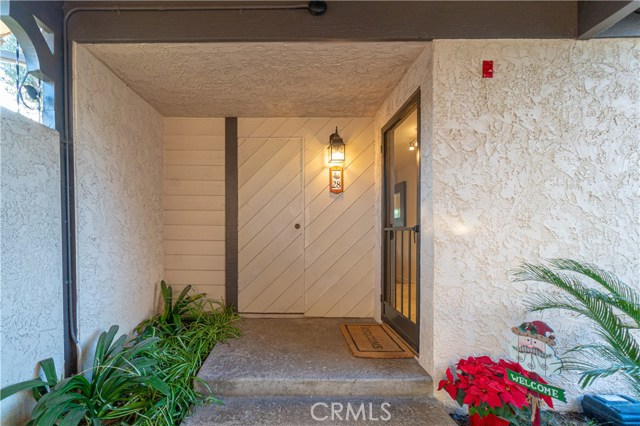 Entryway with extra storage room.