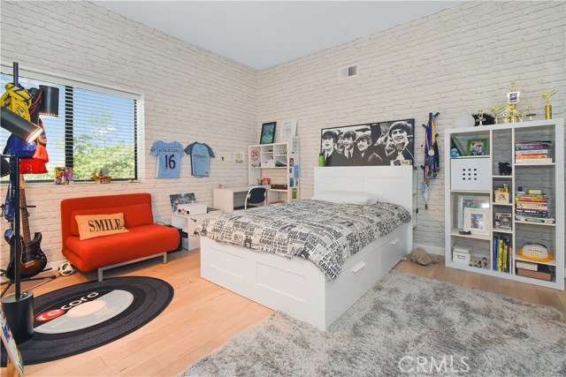 Bedroom 3 with walk-in closet and ensuite bath.