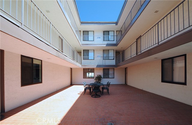 Entry patio looking at kitchen window of unit