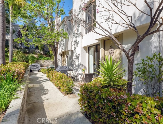 Walkway leading to front door of townhome