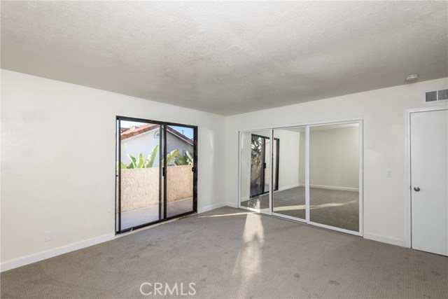 Master Bedroom exits to an outside Rear Patio!
