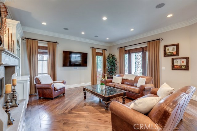 Family room with refinished hardwood floors