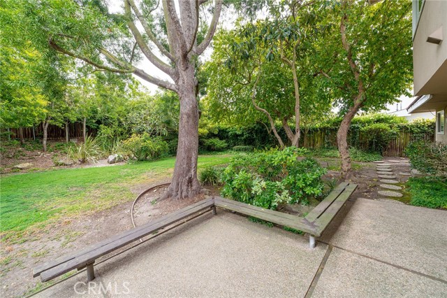 Large outdoor patio with bench gives you and guests a lot of options for outdoor get togethers.