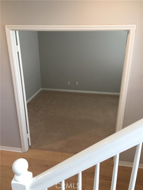 Downstairs bedroom being used as an office.