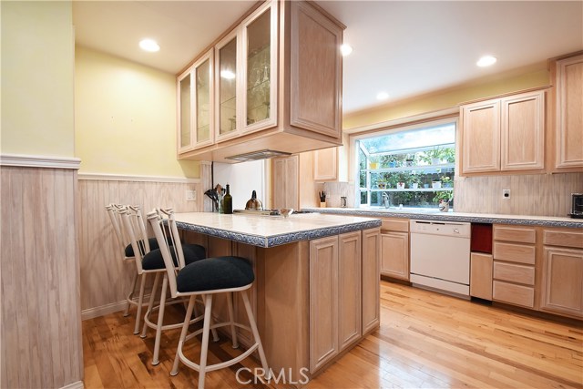 Kitchen with garden window and gas cooktop