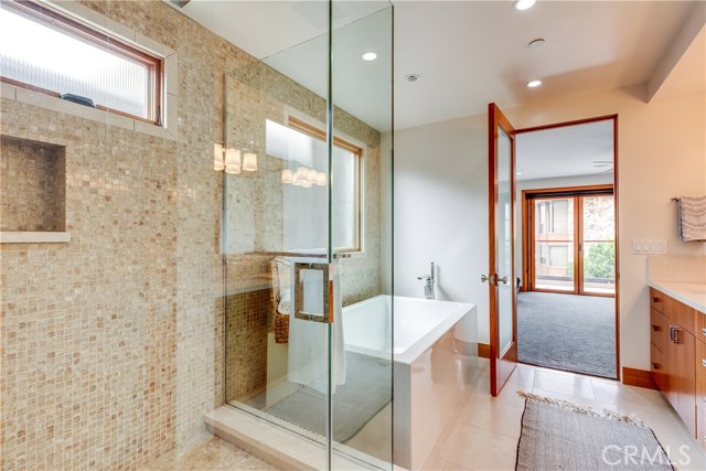 The master bath is your personal spa and offers a soaking tub and walk in shower that lead to a large walk in closet.