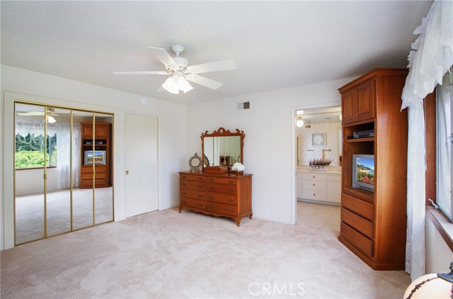 Mirrored closet doors to walk in closet
