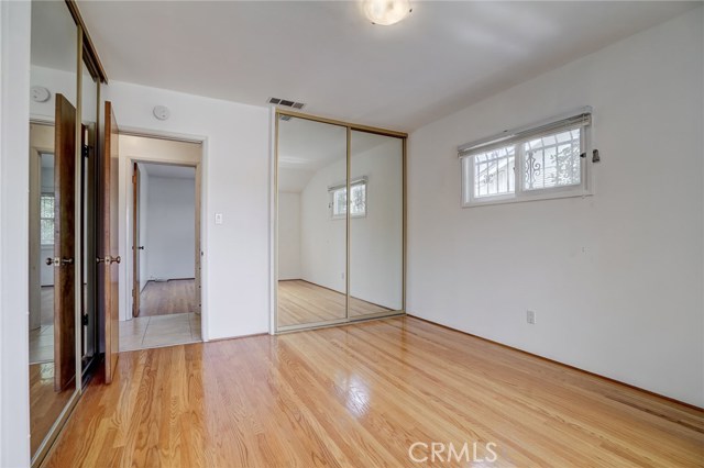 Bedroom #3 Double Mirrored closet doors.