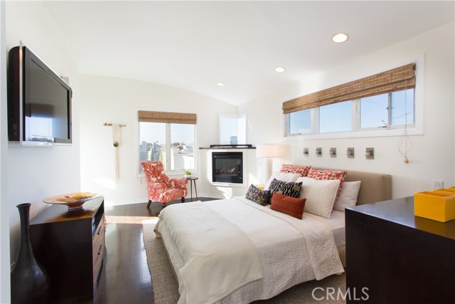 3rd Level. Master Bedroom With Fireplace, Private Bath, Walk-in Closet, And Direct Access To Outdoor Balcony.