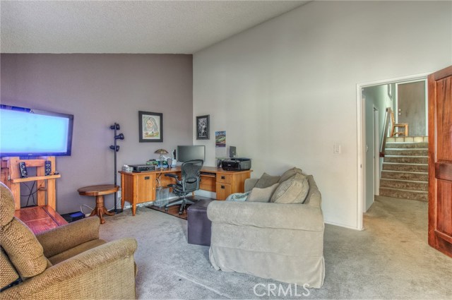 Large downstairs bedroom with sliding glass doors to backyard