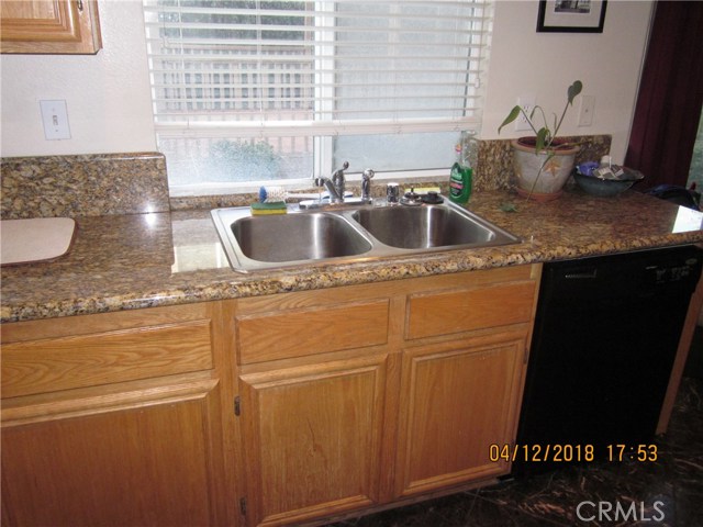 Kitchen cabinets beautifully maintained.