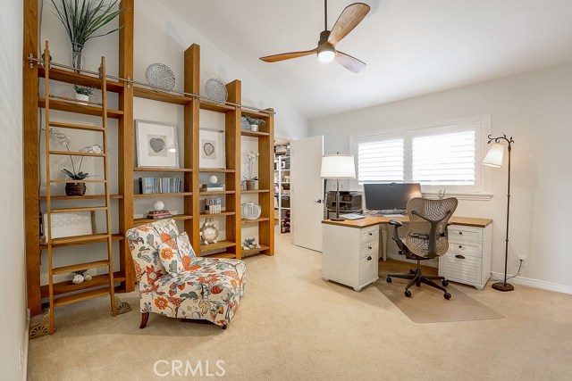 3rd bedroom with built in library shelves, walk in closet and a powder room attached!