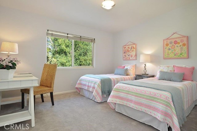 Upstairs Middle Bedroom with View of Back yard below.