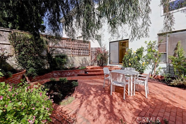 You can see both bedrooms from the south east back yard area corner. The first bedroom with sliding doors and the east side 2nd bedroom with good view sized window.