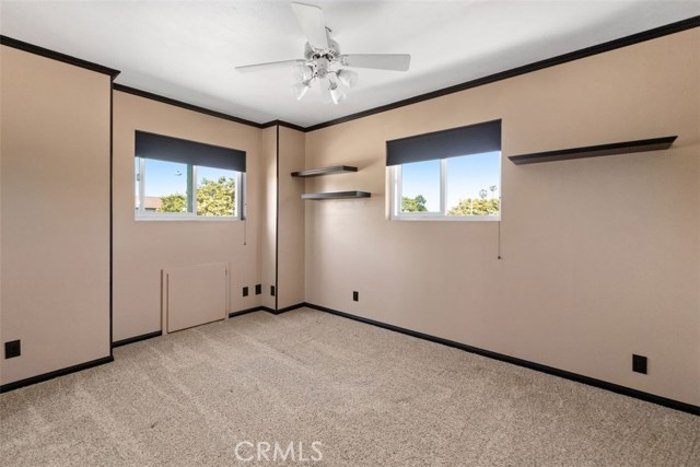 Upstairs bedroom/gym with custom black out shades