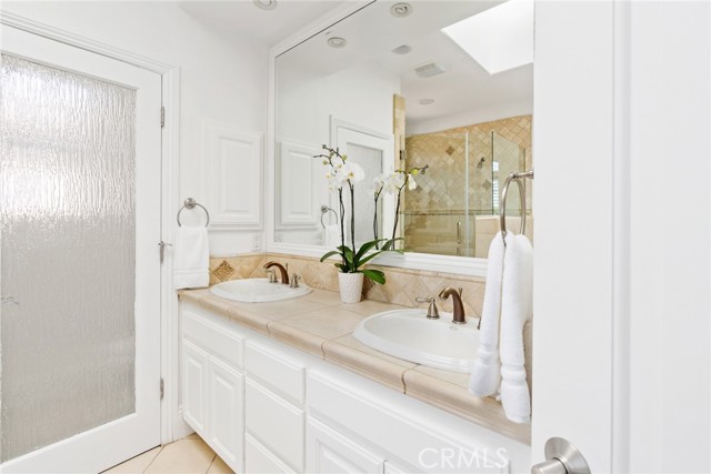 Dual-sink vanity in master bathroom.