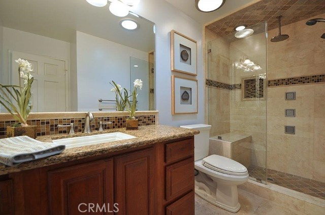 Downstairs Bathroom with shower and body sprays.