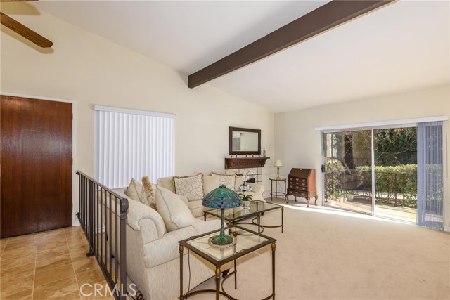 Spacious family room opens up to patio area.