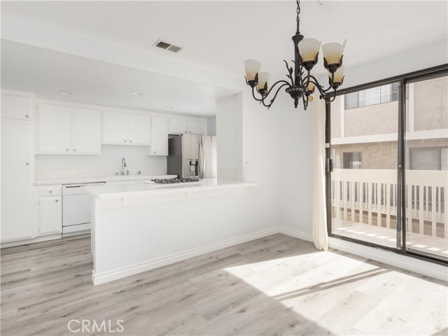 Dining area looking toward kitchen and deck