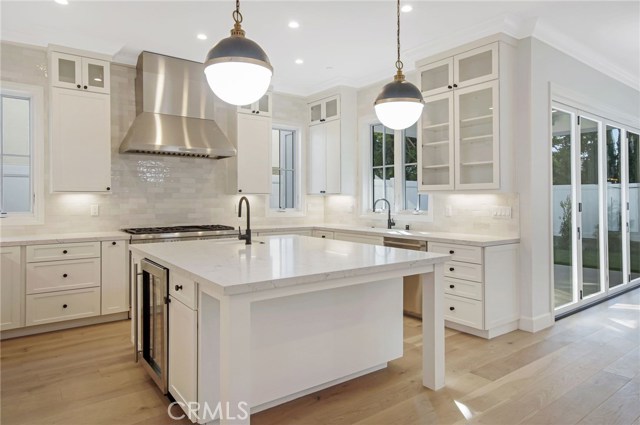 Great kitchen for cooks with walk-in pantry, two sinks, beverage center, thoughtful cabinets and Thermador appliances.