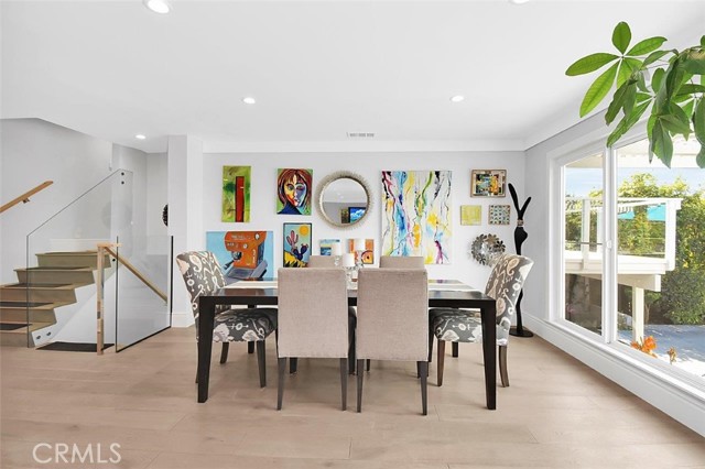Dining inside but feeling like you are dining al fresco. Giant picture window bringing the outside in!