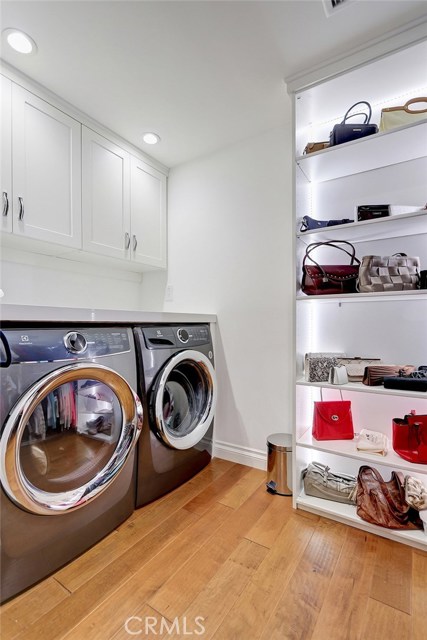 Laundry in downstairs master closet