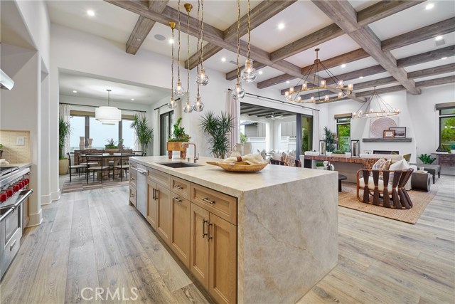 A2 model kitchen, dining room & great room view.