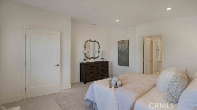 Another view of master bedroom, wired for TV behind mirror