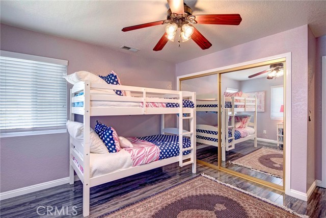 Additional large upstairs bedroom #1 with stunning flooring.