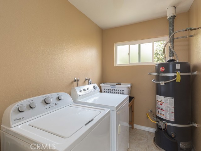 Laundry room is conveniently located on the top level (near the bedrooms).