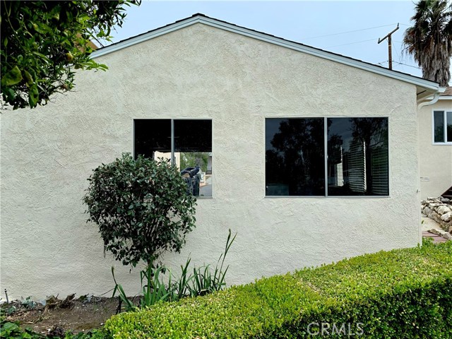 Rear of garage, has windows; bright for bonus room.