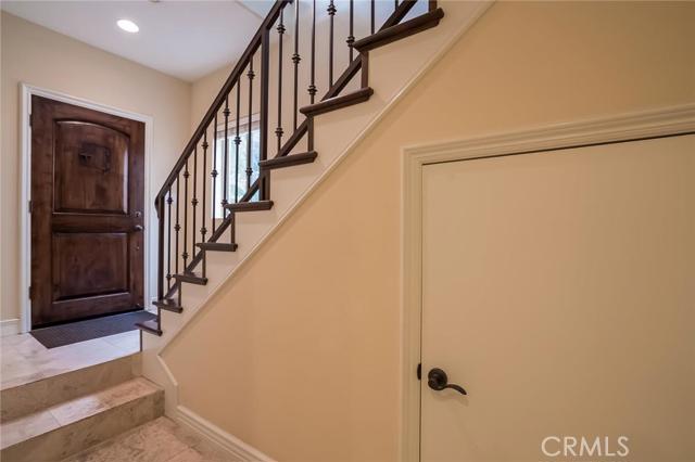 Storage closet under the stairs