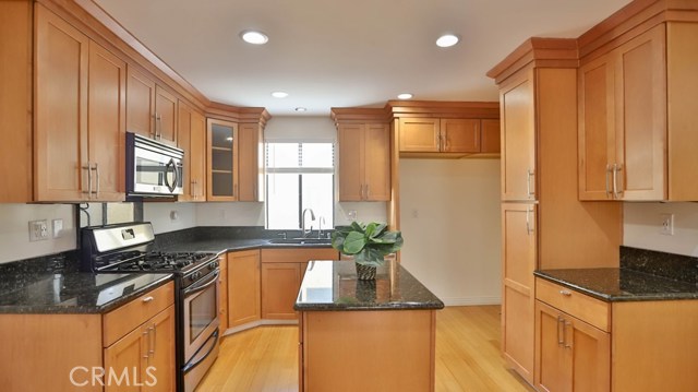 maple cabinetry and soft closed drawers