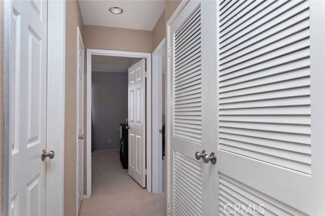 Upper level hallway and laundry area.